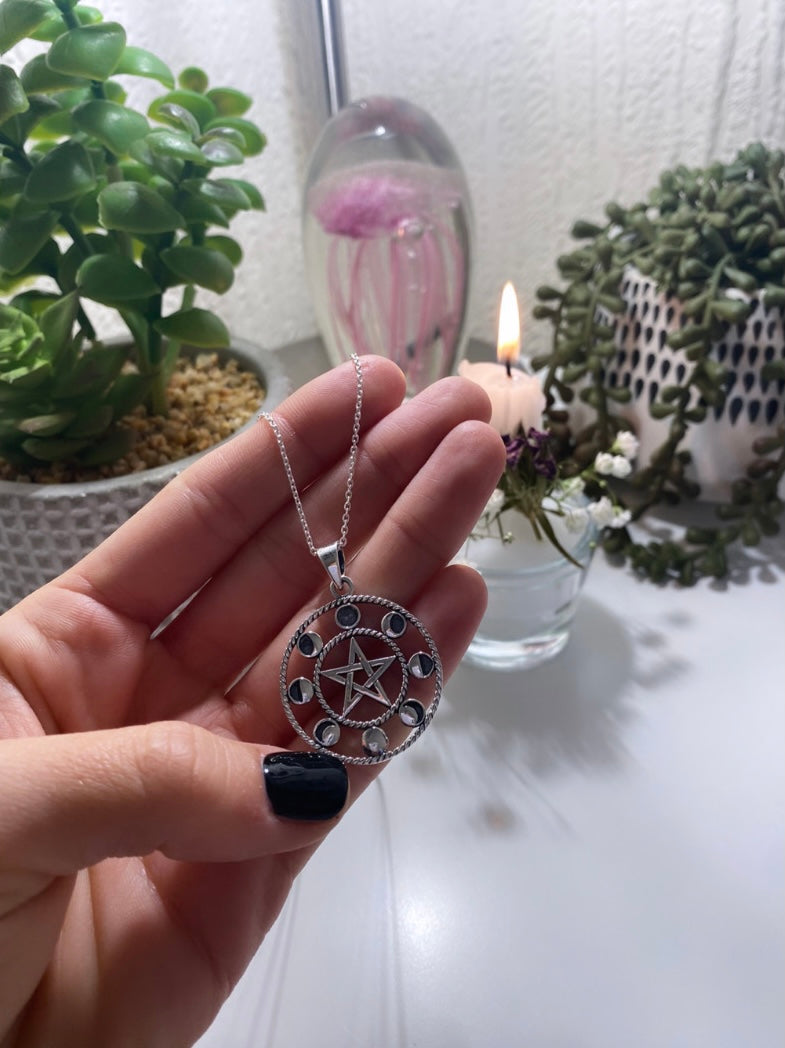 Phases of the Moon silver pendant